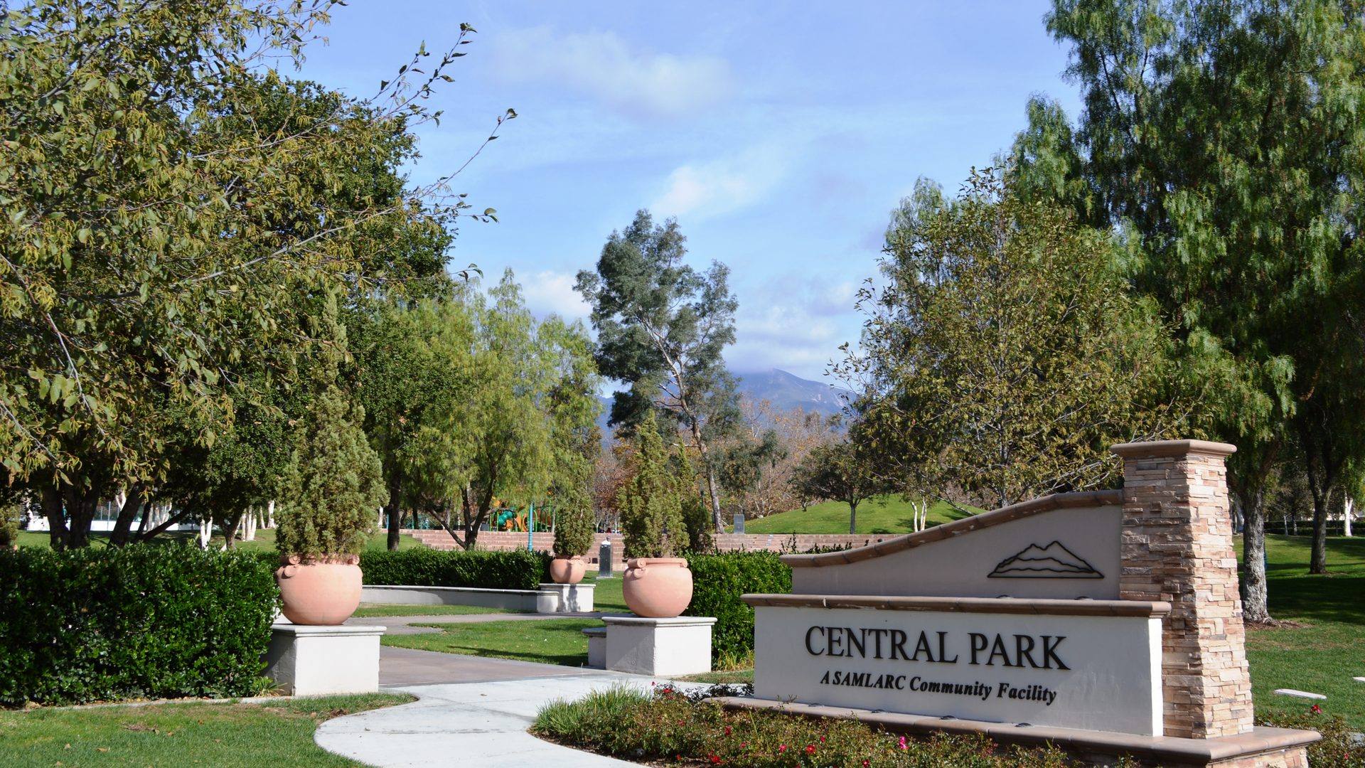 Central Park in Rancho Santa Margarita, with Saddleback beyond the trees.