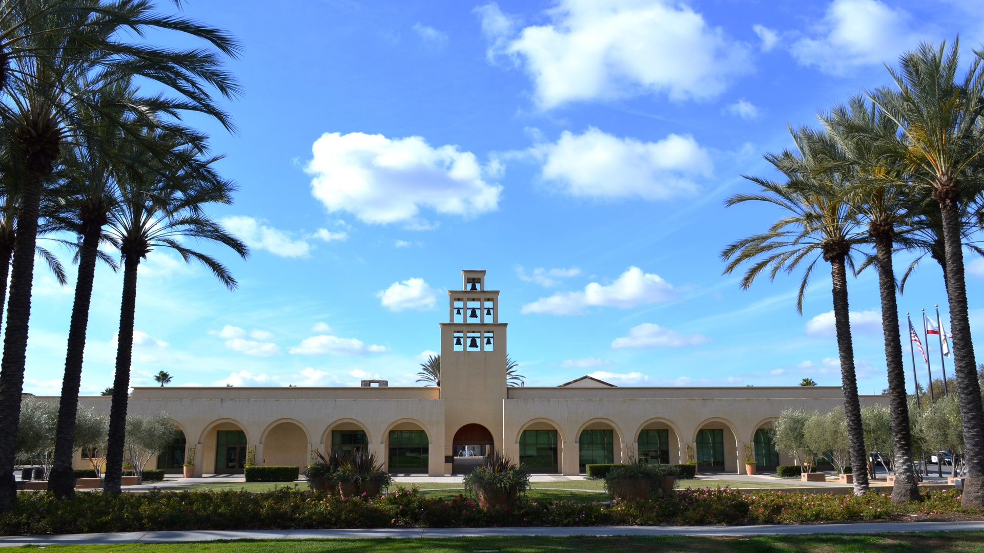 Rancho Santa Margarita Civic Plaza and Bell Tower, with palms and a clear sky.
